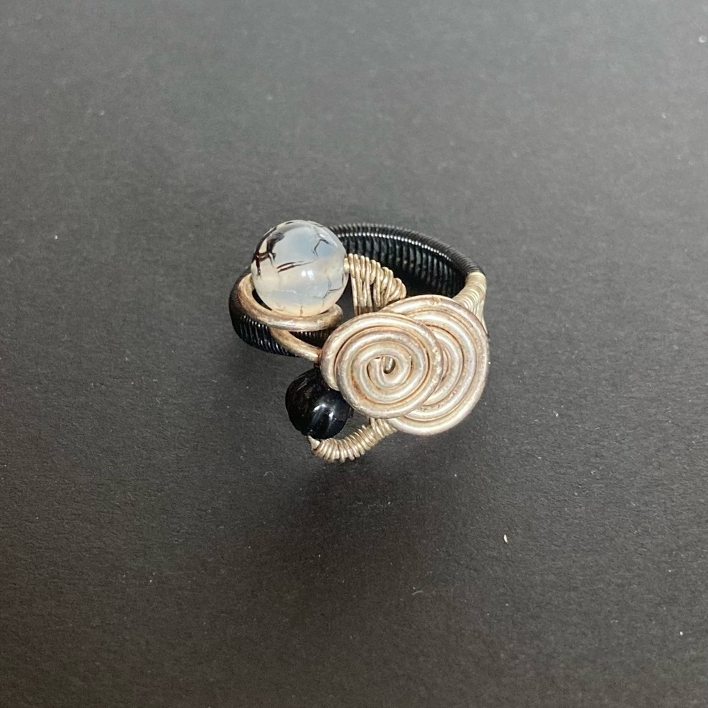 Black and silver ring